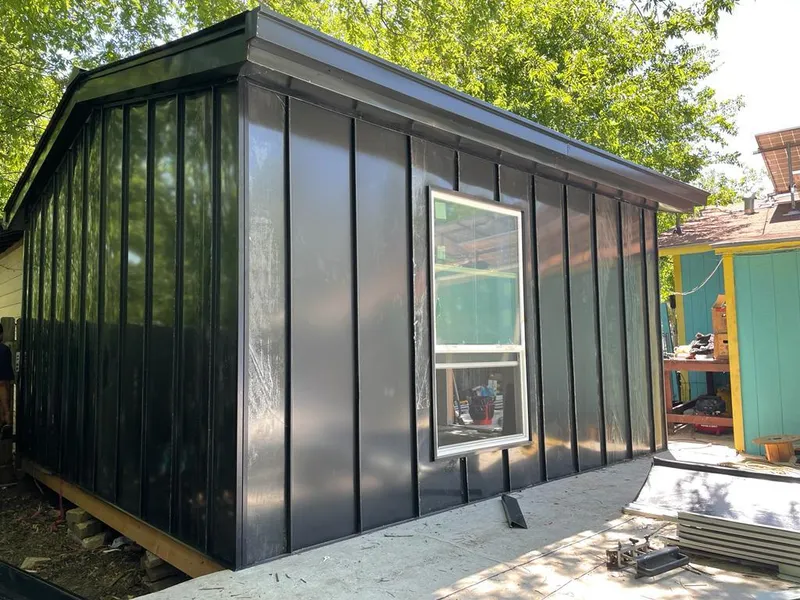 Black standing seam metal wall panels for Roof Inspection in Coshocton