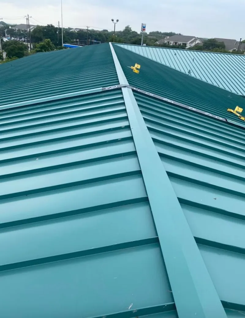 Green commercial metal roof ridge and valley for Metal Roof Repair in Coshocton